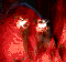 Red-toned animated icon shows a figure with glowing eyes and blue headband against dark background, changing facial expression across frames.