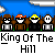 Pixel art image of four characters standing behind a fence under blue sky with clouds, text below reads 'King Of The Hill' in blocky font.
