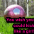 Pixelated image of a pink and white mushroom-like object with blue center on green grass, overlaid by three lines of magenta text.