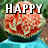 A watermelon slice on a blue surface with text overlays reading HAPPY, B-DAY, and TAYLOR in white block letters.