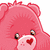 A pink Care Bear character with a heart on its nose and chest, shown in two frames of an animation where the bear holds up a white cloth revealing hearts.