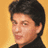 A 48x48 pixel animated contact sheet showing three sampled frames of a Bollywood actor with distinct background colors and poses, arranged in a 2x2 grid with one empty gray cell.