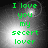 Green text reading 'I love you my secret lover' on a grayscale background with shifting light effects.