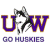 Pixelated static icon featuring a husky mascot leaping over large U and W letters with "GO HUSKIES" text below, all in purple and brown tones on white background.