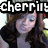 Two side-by-side pixelated images of a woman with long brown hair, one labeled 'cherrit' and the other 'joelle' in white text on black bars.