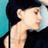 Static 48x48 pixel icon showing a side-profile of a person with short dark hair against a teal and black background, rendered in low-resolution pixel art style.
