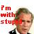 Static pixelated image featuring red text and a partially visible person in formal attire against a light background with subtle color blocks.