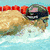 Six- of swimming and Olympic imagery including a swimmer in water, close-up face with goggles, underwater stroke, medalist portrait, Tokyo 2008 logo, and empty space