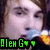 Pixelated close-up of a person's face with light skin and dark hair, featuring green text reading 'Alem G' at the bottom left.