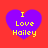 Four identical purple heart shapes on red background with yellow text reading "I Love Hailey" in pixelated font.