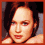 Four pixelated portrait of a person with long brown hair in warm-toned lighting, each showing distinct facial expressions and head angles within a red-bordered