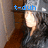 Pixelated static image with blue text 't-duh' overlaid on a blurred background featuring brown, gray, and light tones.