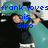 Pixelated image of a person in a teal shirt holding a small object, with blue text overlay reading 'frank loves his dino' against a light background.