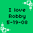 Green background with repeated black text "I love Robby 5-19-08" and white pixelated square patterns at corners.