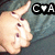A hand with a peace sign gesture appears in four , showing slight movement of fingers and thumb against a blue fabric background