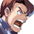 Pixelated static image of a cartoon character with brown hair, blue eyes, and an open mouth showing teeth, wearing a dark blue shirt against a white background.
