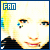 A pixelated image of a person with blonde hair and dark clothing, featuring the text 'FAN' in blue at top-left corner.