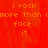 Red background with orange pixelated text reading 'i rock more than u more than u face it' repeated across the image, partially obscured by a gray rectangle.
