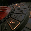 Green text 'I WILL NOT READ SEASON 7 SPOILERS' appears sequentially over a dark circular object with red accents and a small triangular symbol.