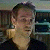 A 50x50 pixel animated buddy icon featuring a split composition with a person on the left and green text on the right, displayed as two sampled frames in a contact sheet layout.