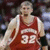 Pixelated image of a basketball player in red jersey with number 32, next to text "Brian Butch #32" on solid red background.