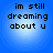 Four identical blue circular icons with pixelated black text reading "im still dreaming about u" arranged in a on a solid blue background