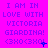 A static image displays repeated text on a bright pink background with blue and purple pixelated elements.