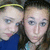A static image of two people with yellow headbands and blue tops, positioned side-by-side in a
