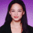 A pixelated image of a person with long dark hair against a purple background, next to green text reading 'OriginalIcons.com' on a dark green backdrop.
