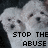 Pixelated image of two white dogs with dark eyes and noses, overlaid with black text reading "STOP THE ABUSE" on a dark background.