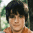 Two side-by-side pixelated portraits of a young person with dark hair, above yellow text on a dark blue background reading "BRIDGE TO TERABITHIA" and "February 16".