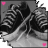 Black-and-white pixelated image of a person in striped clothing with pink heart symbols and text variations on dark backgrounds.