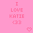 Pink background with pixelated text 'I LOVE KATIE <33' repeated twice, two heart symbols at bottom center and right.