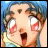 Pixelated anime-style character with wide eyes and open mouth, blue background, silver text "Anime IM" and "com" on black right side.