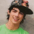 A person in a green shirt and patterned cap appears across four with one displaying 'HOTTIE' text overlay