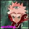Anime-style character with spiky pink hair and red sideburns, wearing a dark jacket with white trim, against a blurred green background with pink text at bottom.