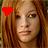 Static 48x48 pixel icon showing a close-up of a person with long brown hair and a red accessory on the left side, rendered in low-resolution pixel art style.