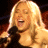 A 48x48 pixel animated contact sheet showing two frames of a woman singing with green text on the right side reading "Original Icons .com".