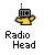 Pixelated icon shows a yellow figure with arms raised holding a gray radio, below which text reads "Radio Head" in black and white pixel font.