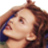 Pixelated close-up of a person's face with brown hair and light skin tone, captured in a static 48x48 icon format.