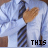 A person in a light blue dress shirt and striped tie with hands clasped over chest, displaying text "THIS" then "I" then "SHEAR"