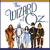 Four distinct cartoon-style images arranged in a : The Wizard of Oz characters, Looney Tunes Bugs Bunny, Batman, and WBShop.com logo