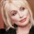 Pixelated image of a person with blonde hair and red lipstick, next to bold text reading "DOLLY PARTON" on a brown background.
