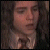 Six pixelated frames of a person with long brown hair in various facial expressions and head positions, arranged in two