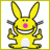 Yellow cartoon rabbit with pink nose and gray accents, smiling widely with raised arms in a four