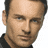 A 48x48 pixel buddy icon featuring a split composition with a person's face on the top-left, "nip/tuck" text on the top-right, and an FX logo in the bottom-left quadrant of a contact sheet layout.