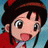 Pixelated anime-style character with brown hair and red clothing on left, black background with white text "Anime IM" above smaller "com" on right.
