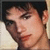 A pixelated contact sheet of two animated frames showing a person's face on the left and stylized text on the right against a white background.