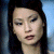 A split-frame contact sheet showing a pixelated image of a person on the left and green text reading "Original Icons .com" on the right against a dark background.