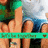 A pixelated image shows a person's hand making an obscene gesture with the middle finger extended, set against a blurred background of green and blue tones.